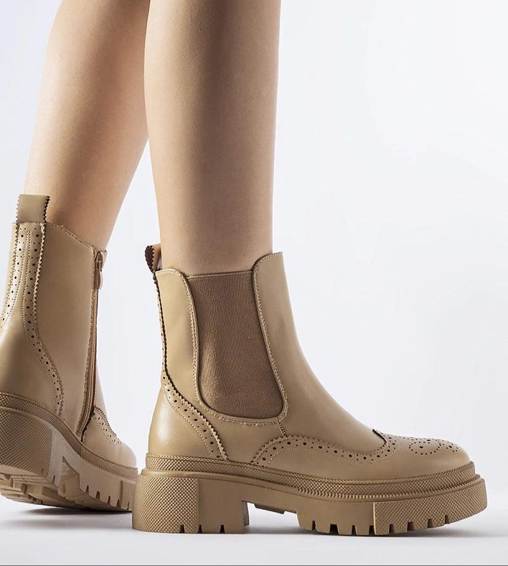 Alt Tag: Beige Castressa Stitched Ankle Boots with elastic panels and discreet zipper, showcasing a sculpted silhouette and elegant design.