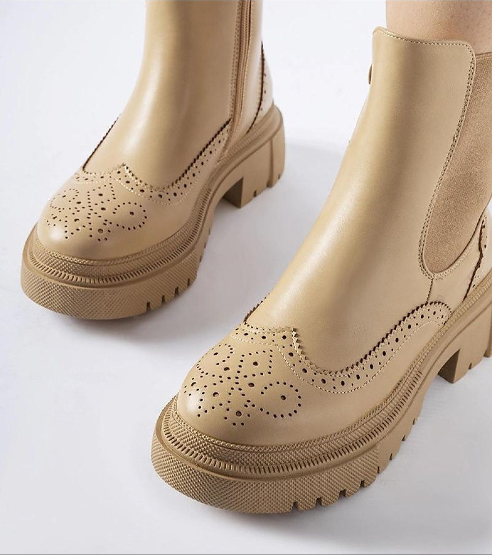 Beige Castressa Stitched Ankle Boots with sculpted silhouette and stitched accents, featuring elastic side panels and rounded toe.