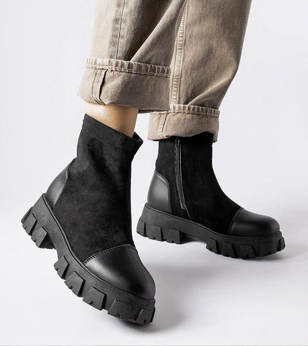 Trevaya suede platform baggers with eco-friendly black suede, chunky sole, and side zipper for style and comfort.