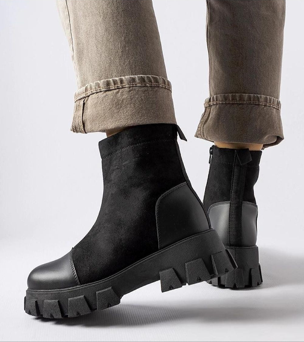 Black Trevaya Suede Platform Baggers with eco suede, rounded toe, rubber sole, and side zipper, styled for cooler seasons.