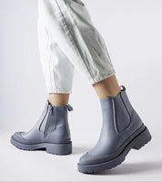 Alt Tag: Varenta Weatherproof Platform Boots featuring sleek waterproof upper and chunky sole for urban and outdoor wear in gray.