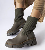 Avidra Knit Platform Boots with green sole and stretch-knit upper, featuring rounded toe and platform base for stylish, comfortable wear.