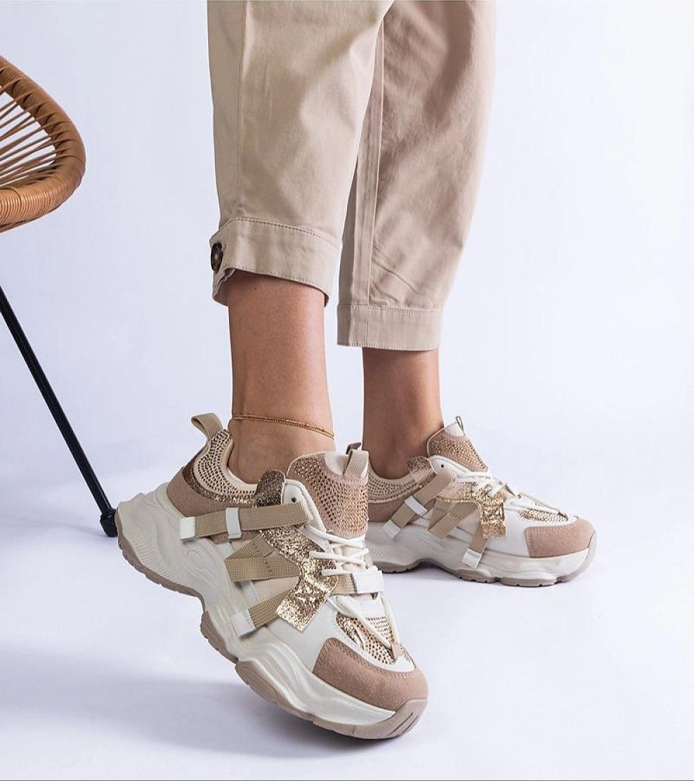 Avessia Elevated Suede Accent Sneakers with eco suede upper and 6 cm platform, worn with beige pants for a chic casual look.