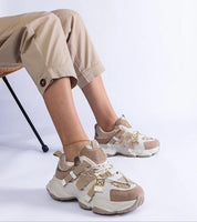 Person wearing Avessia Elevated Suede Accent Sneakers with shimmering inserts and sculpted sole.