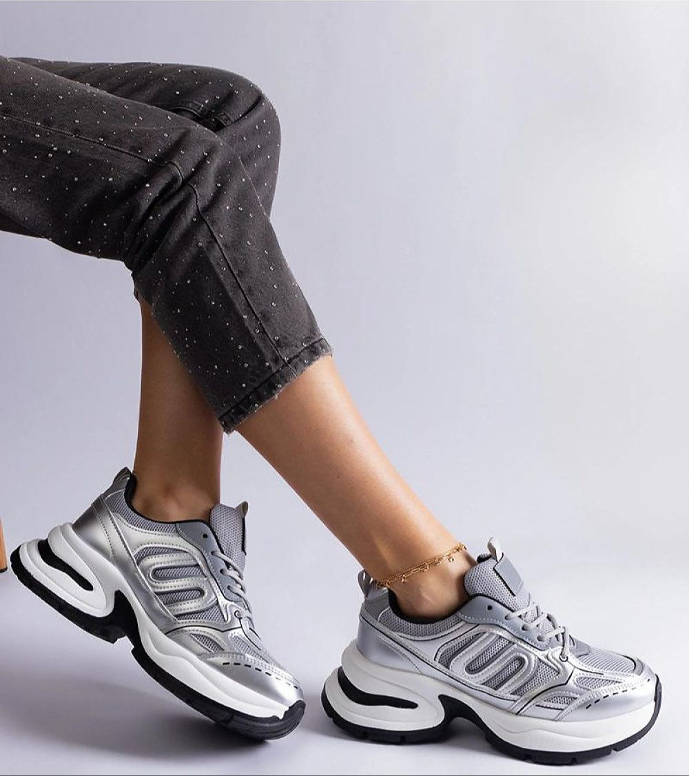 Lunvera Metallic Sport Style Sneakers with silver upper and black rubber sole, showcasing modern city-ready design and eco-friendly materials.