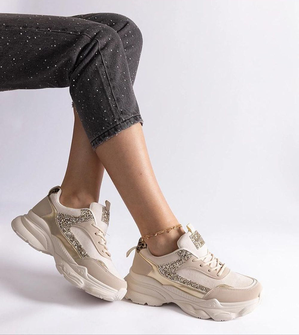 Elyvanna suede sneakers with brocade accents, featuring a thick white sole and lace-up design for comfort and style.