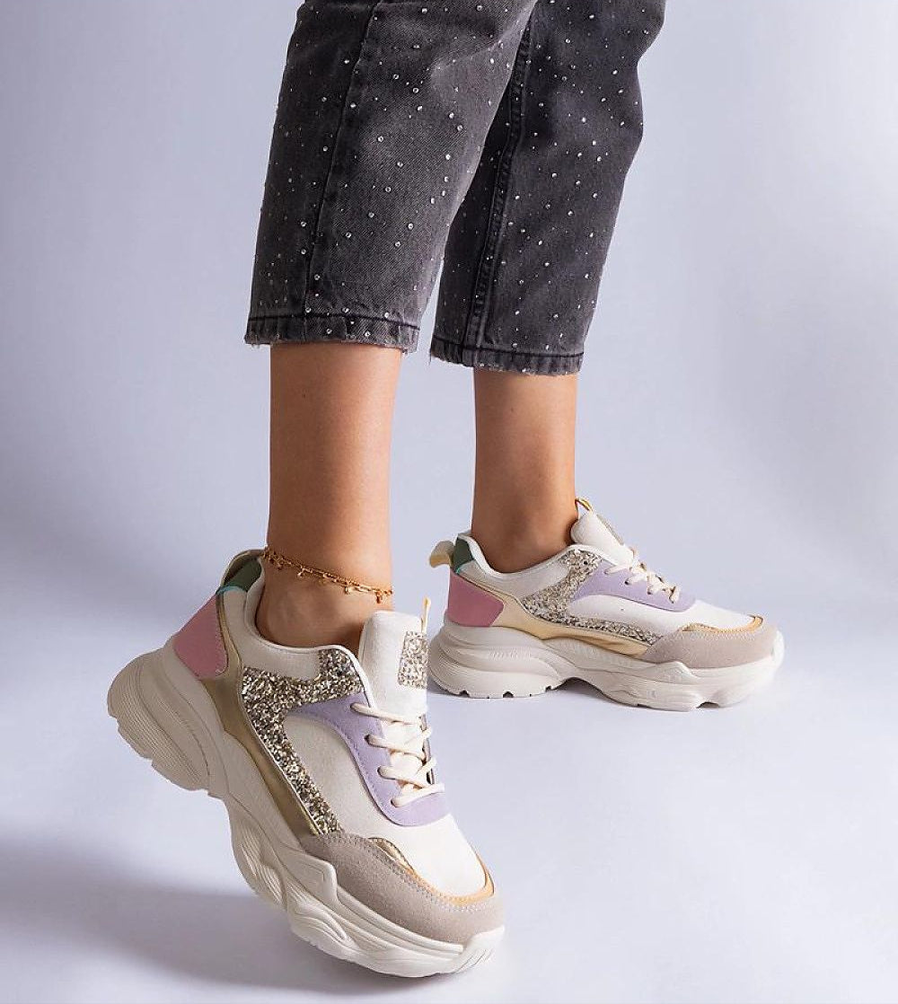 Elyvanna Brocade Panel Sneakers in beige suede with shimmering brocade accents, thick white rubber sole, lace-up style for comfort and elevation.