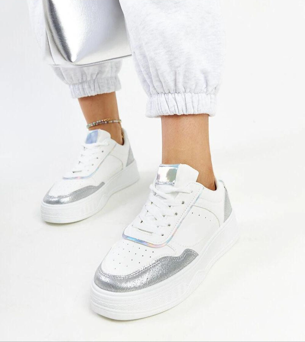 Norevia Silver-Edged Sneakers with sculpted silhouette, silver accents, chunky white sole, matte leather, and suede-like textures.