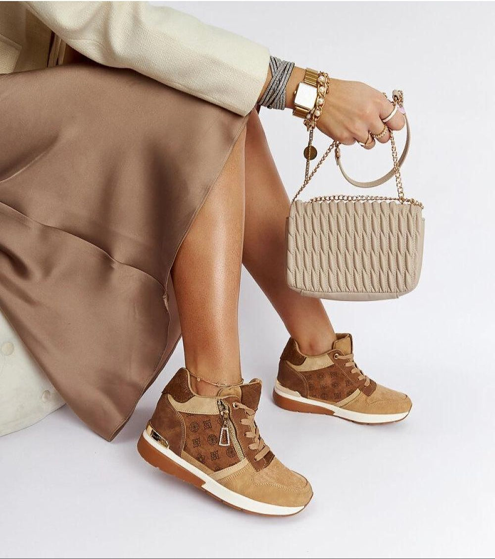 Woman wearing Valterra Brown Wedge Sneakers with 8 cm heel, styled with a matching dress and handbag, showcasing casual elegance.