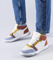 Person wearing Aurelyth Suede-Touch Ankle Sneakers with jeans, featuring eco leather and a 3 cm sole for casual summer style.