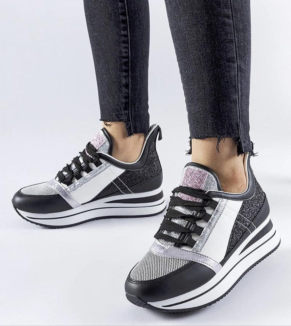 Glevara Glitter Platform Sneakers in black synthetic leather with silver accents, shown on feet, perfect for stylish summer outfits.