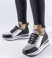 Glevara Glitter Platform Sneakers in black synthetic leather with silver accents, shown on feet, perfect for stylish summer outfits.