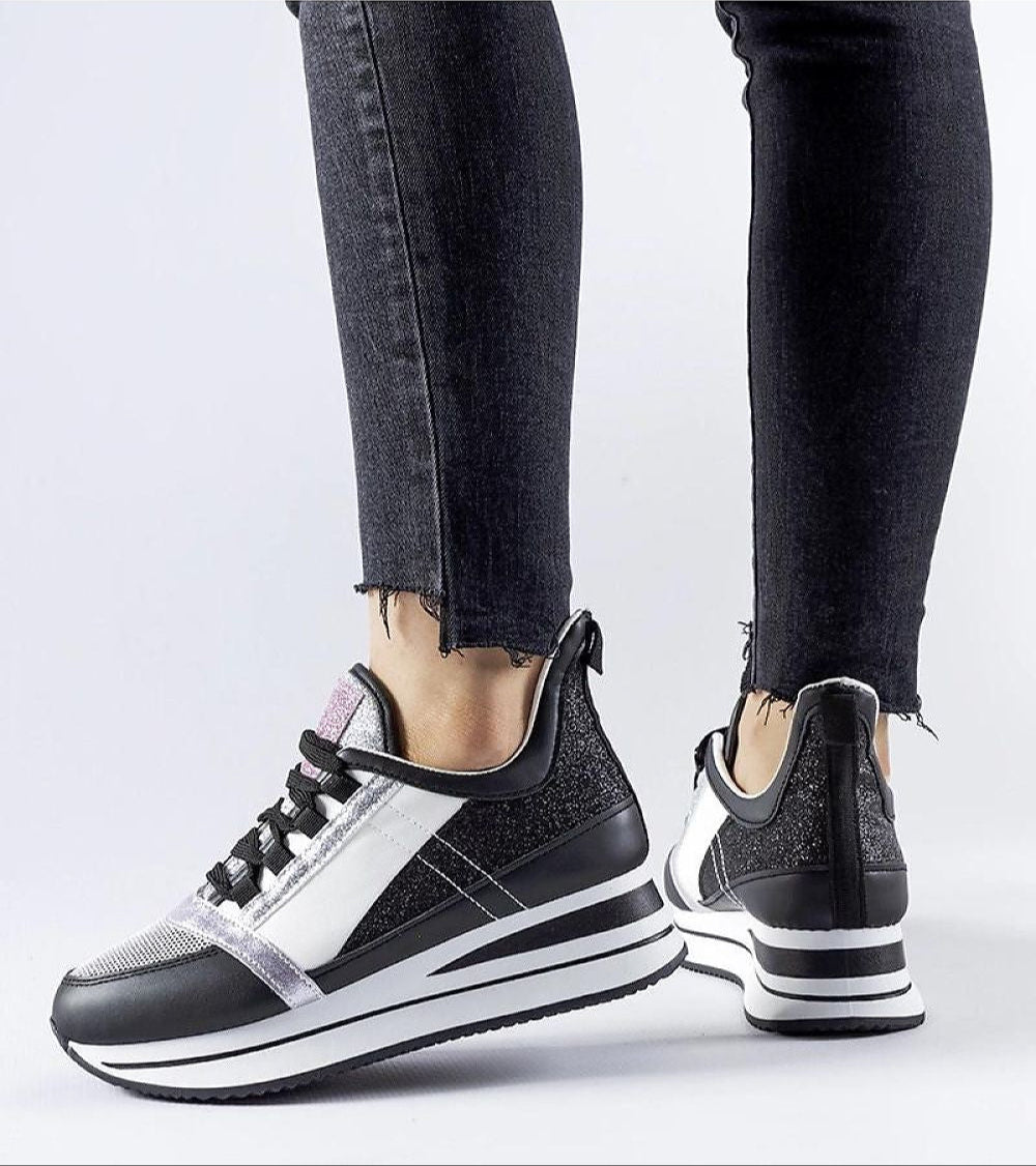 Glevara Glitter Platform Sneakers with shimmering black synthetic leather and elevated sole showcasing a bold summer style.