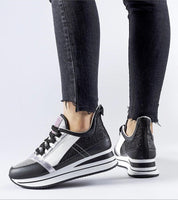 Glevara Glitter Platform Sneakers with shimmering black synthetic leather and elevated sole showcasing a bold summer style.