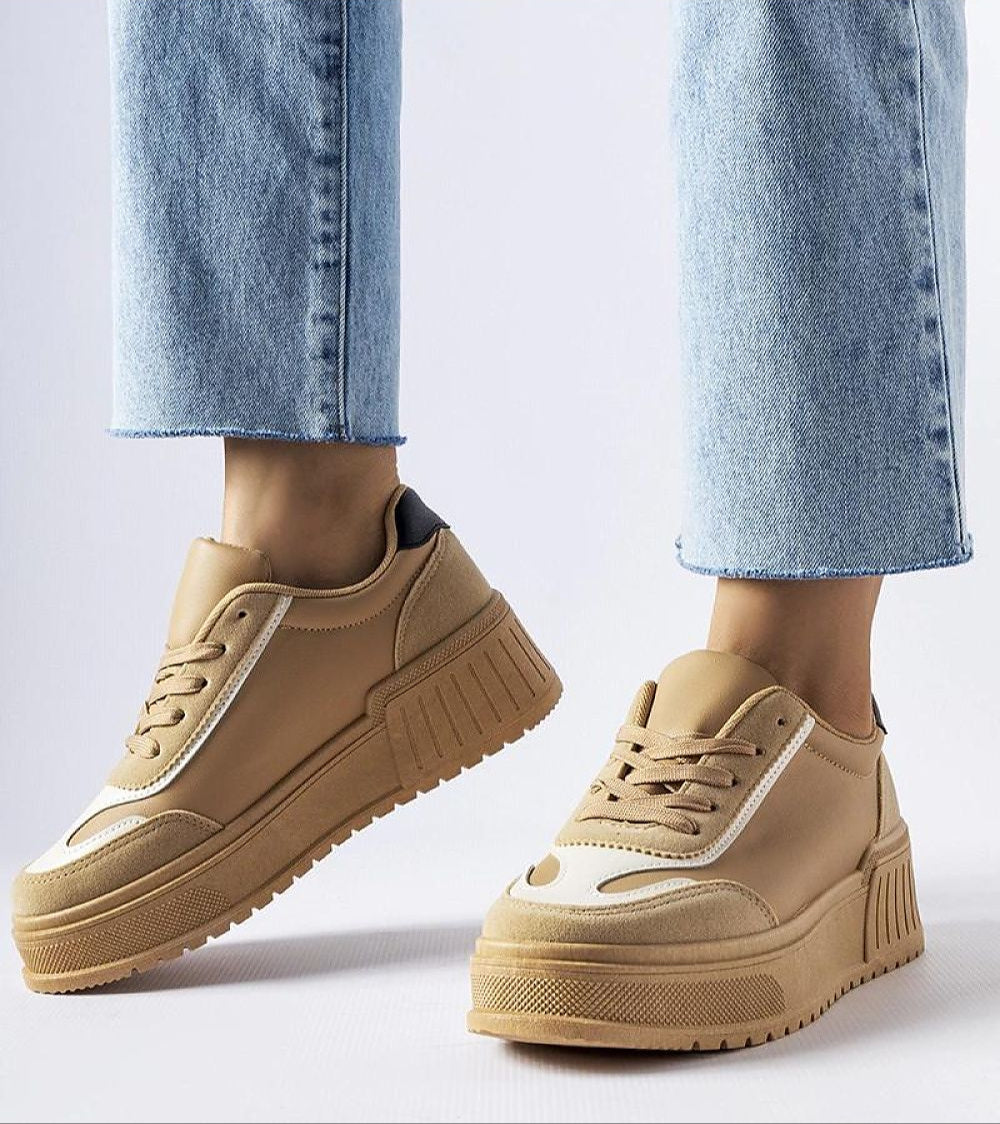 Eralina Flexible Sole Summer Sneakers in dark beige with 5 cm heel, worn with jeans, offering spring and summer comfort.