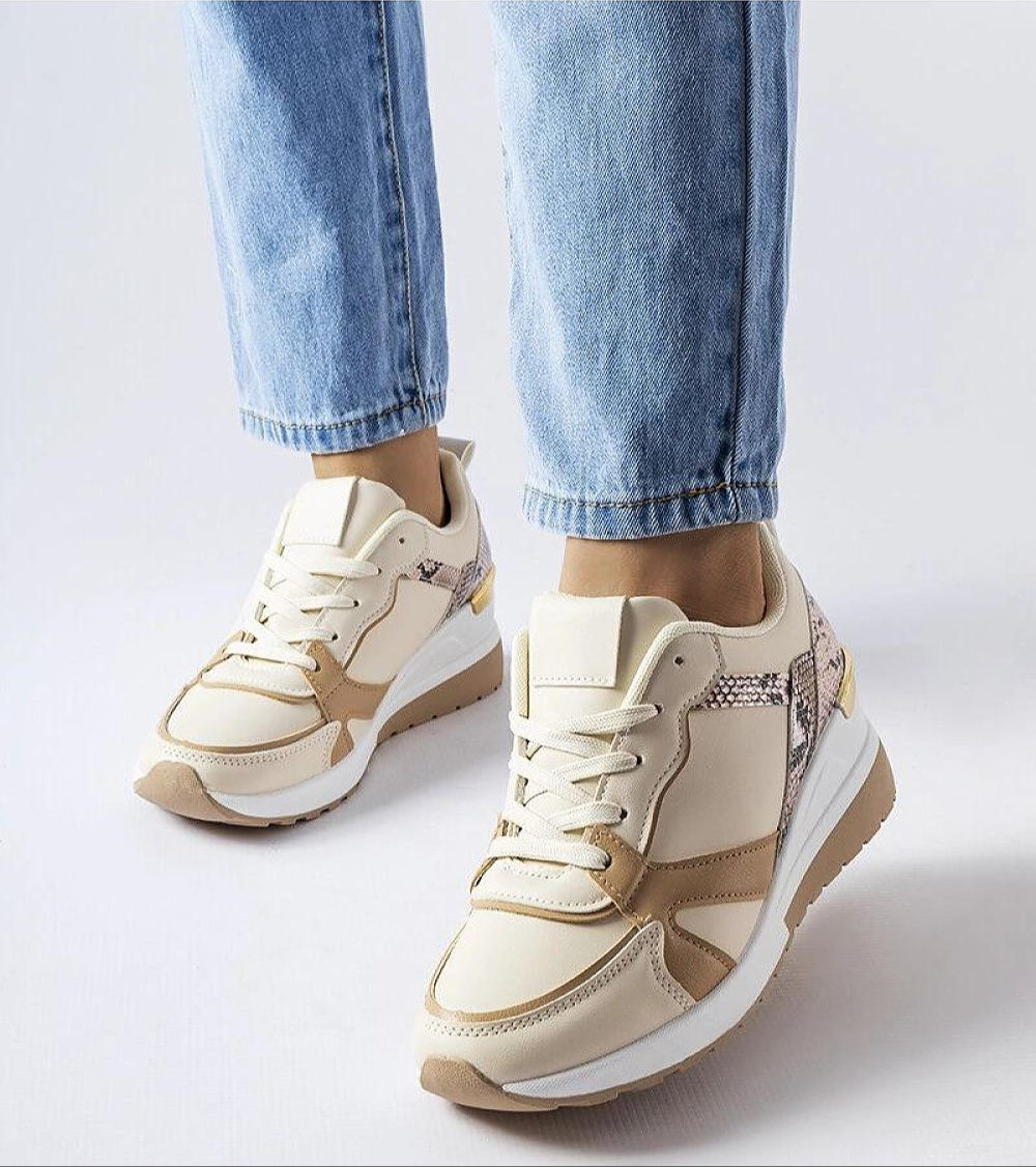 Nerelda lace-up wedge sneakers in beige tones, featuring a 5.5 cm wedge sole, eco-friendly faux suede, paired with blue jeans for a casual look.