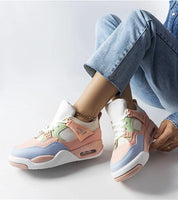Pastel-colored sneakers worn with light jeans, showcasing a stylish, comfortable design ideal for casual and trendy outfits.