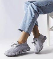Armonia Gray Summer Sport Sneakers with breathable textile, flexible sole, and secure lace-up design, paired with jeans for casual wear.