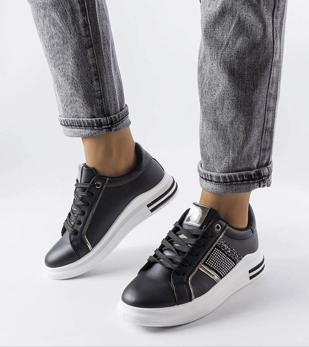 Person wearing Meralla Rhinestone Platform Sneakers with shimmering rhinestones, elegant beige tone, and 4 cm sole for stylish comfort.