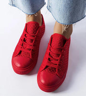 Red Revarya woven lace-up summer sneakers with breathable upper and flexible sole, perfect for warm weather and casual outfits.