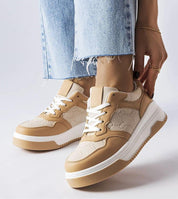 Person wearing Mirevon Embossed Platform Sneakers with eco leather upper and 5 cm rubber sole, styled with light jeans.