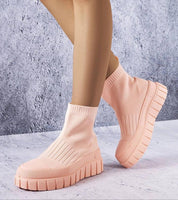 Viondra stretch knit platform sneakers in pale pink, featuring a slip-on design and chunky 6 cm sculpted sole for style and comfort.