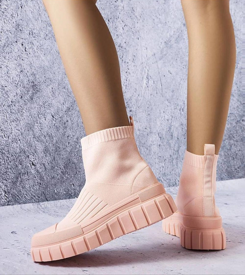 Viondra Stretch Knit Platform Sneakers in soft pink with sock-like upper and sculpted platform, showcasing flexible slip-on design.