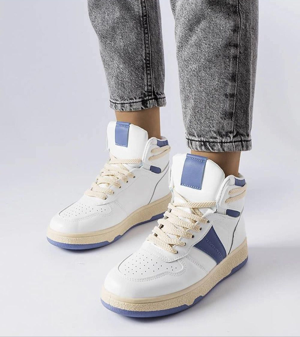 Person wearing Ormelya High-Top Everyday Sneakers in white and blue with eco leather upper and 3 cm sole, showcasing casual styling.