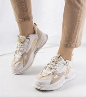 Woman wearing Avenrae Summerline Platform Sneakers with eco leather upper and 4.5 cm sole, beige and white design, on white background.