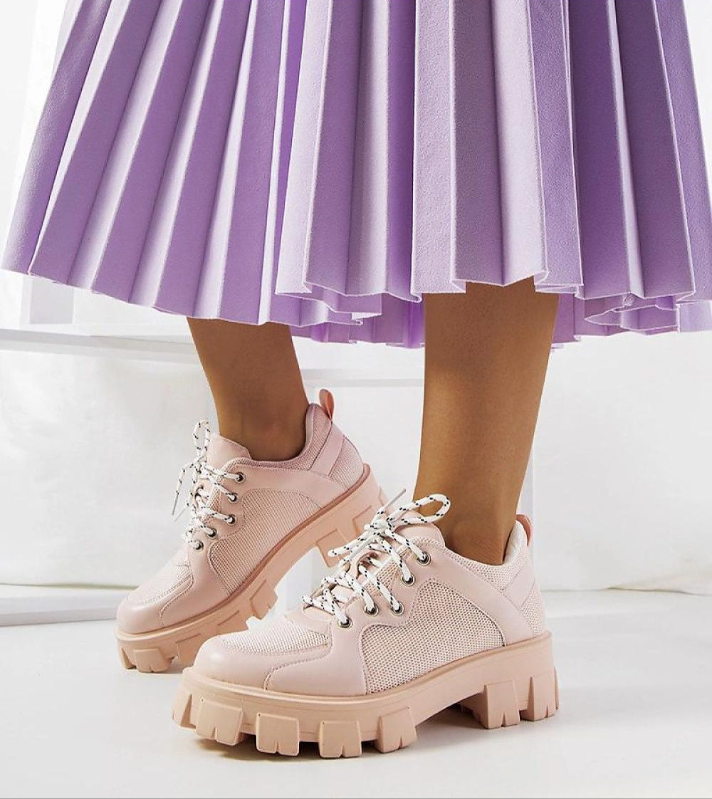 Aurenza Daywalk platform sneakers with eco leather upper and chunky sole in pink, worn with purple skirt for a stylish look.