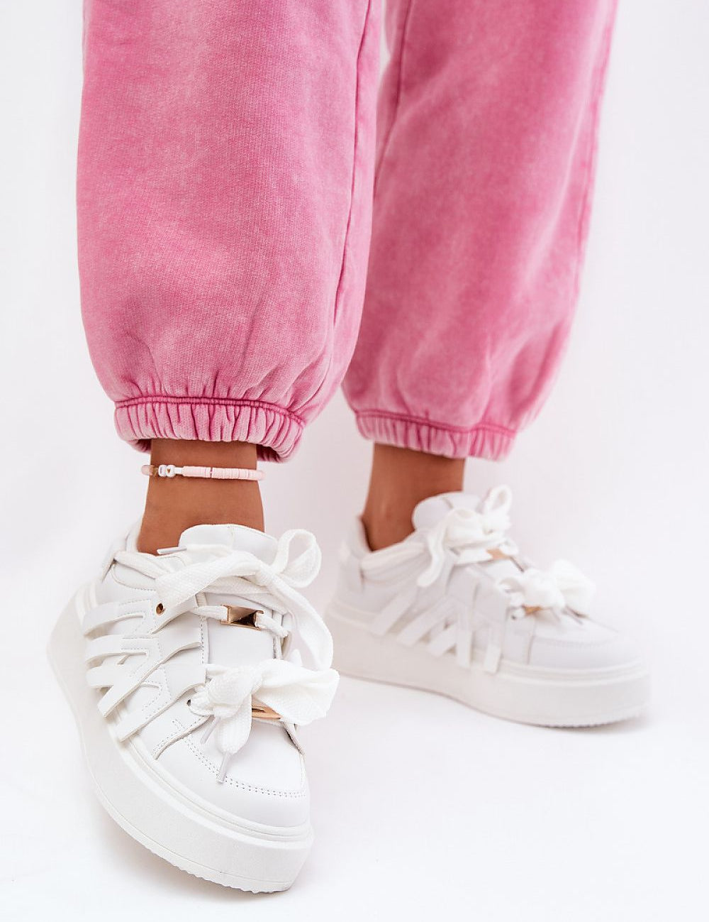 Cernia Synthetic Platform Lace Sneakers with pink pants, showcasing streetwear style and athletic character for versatile looks.
