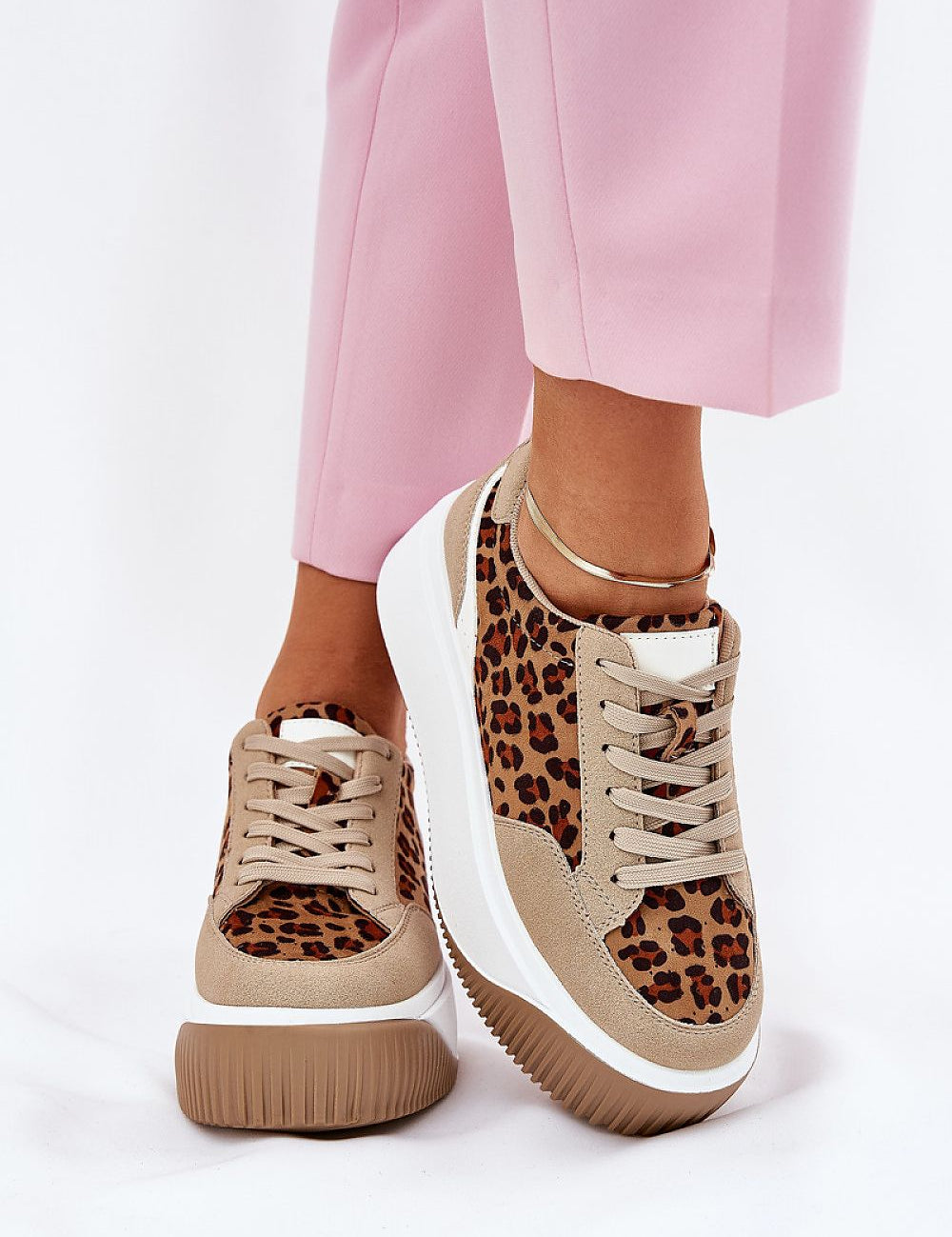 Vervonne Animal Pattern Platform Sneakers with eco leather upper, 5 cm platform, and cushioned insole, worn with pink pants.
