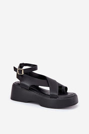 Lirianne Platform Buckle Sandals in black eco leather with wedge platform and ankle strap, perfect for stylish summer wear.