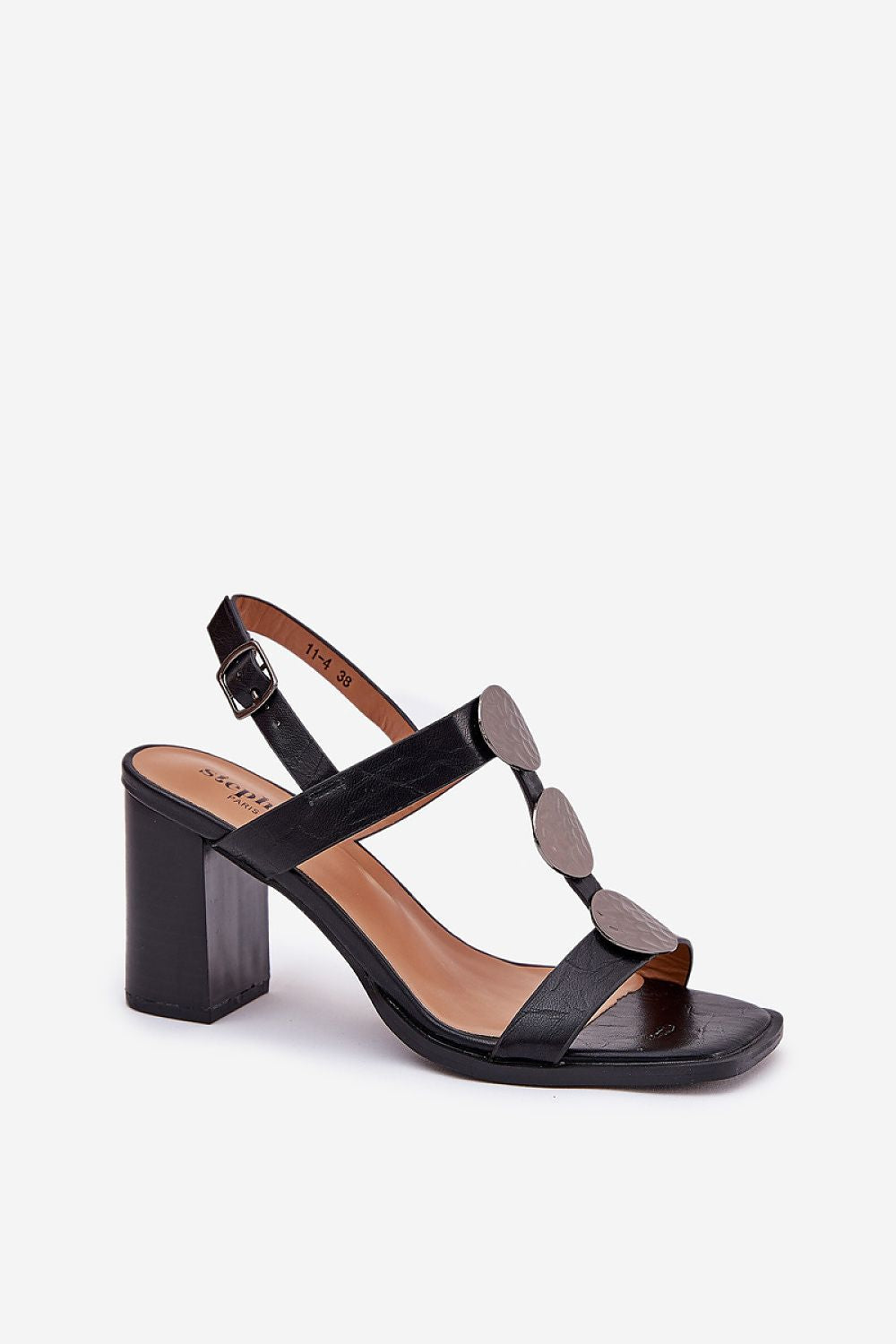 Stylish black leather block-heeled sandals with front embellishments, featuring an adjustable ankle strap and open toe design.