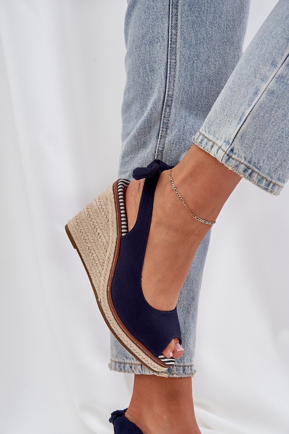 Elavira Wedge Sandals with Braided Finish shown in blue, featuring a soft textile upper and a natural braided high heel design.