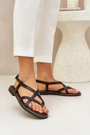 Erinelle interwoven leather sandals with delicate straps and ankle buckle, showcasing allure and elegance for modern summer wear.