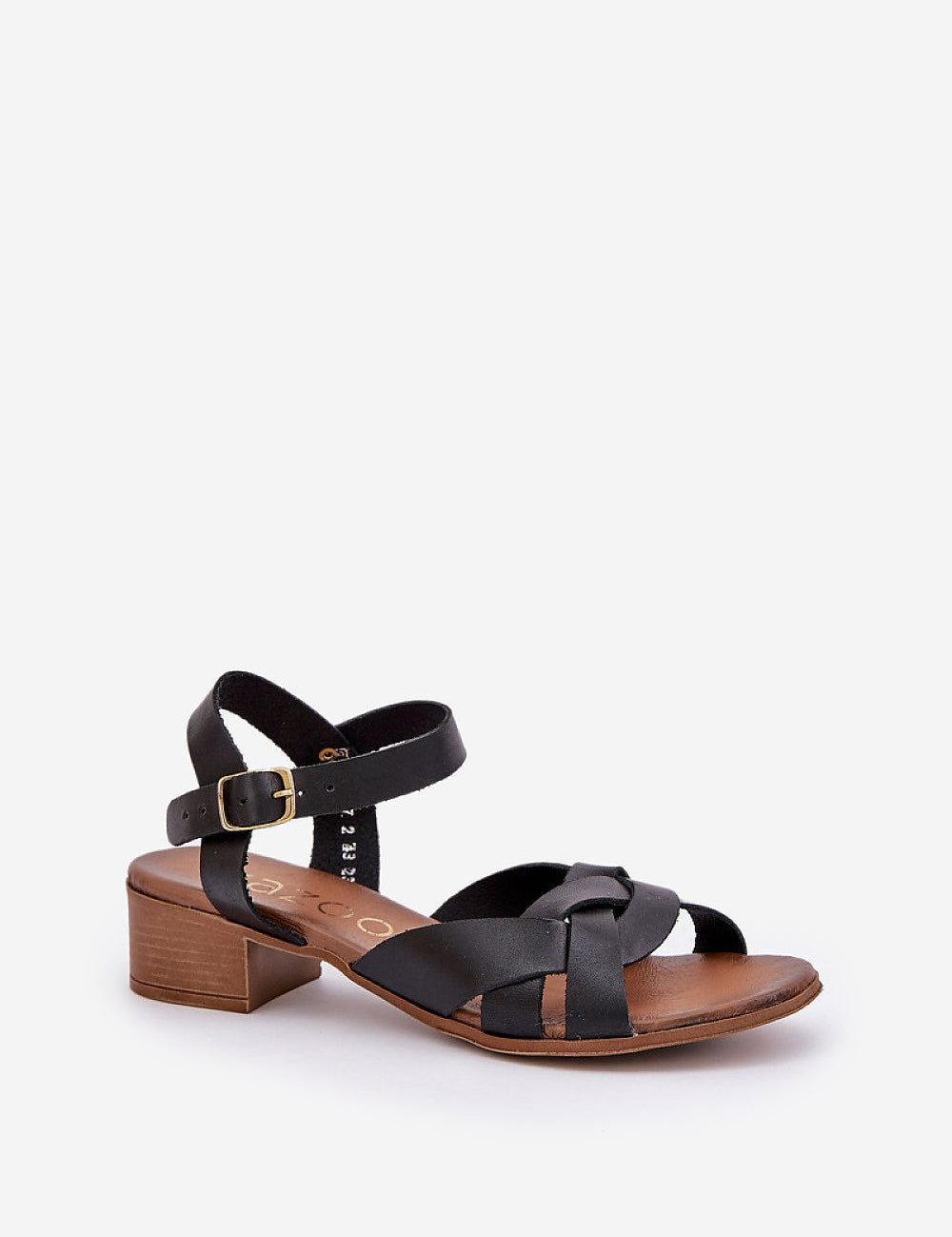 Valerinne cross-strap leather sandals with low block heel and adjustable ankle closure.