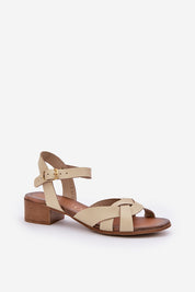 Valerinne cross-strap leather sandals with block heel and adjustable ankle strap, ideal for summer style and comfort.