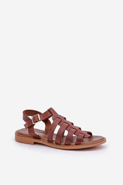 Avelisse Leather Flat Sandals in brown, featuring an adjustable buckle strap and comfortable flat heel, perfect for versatile styling.