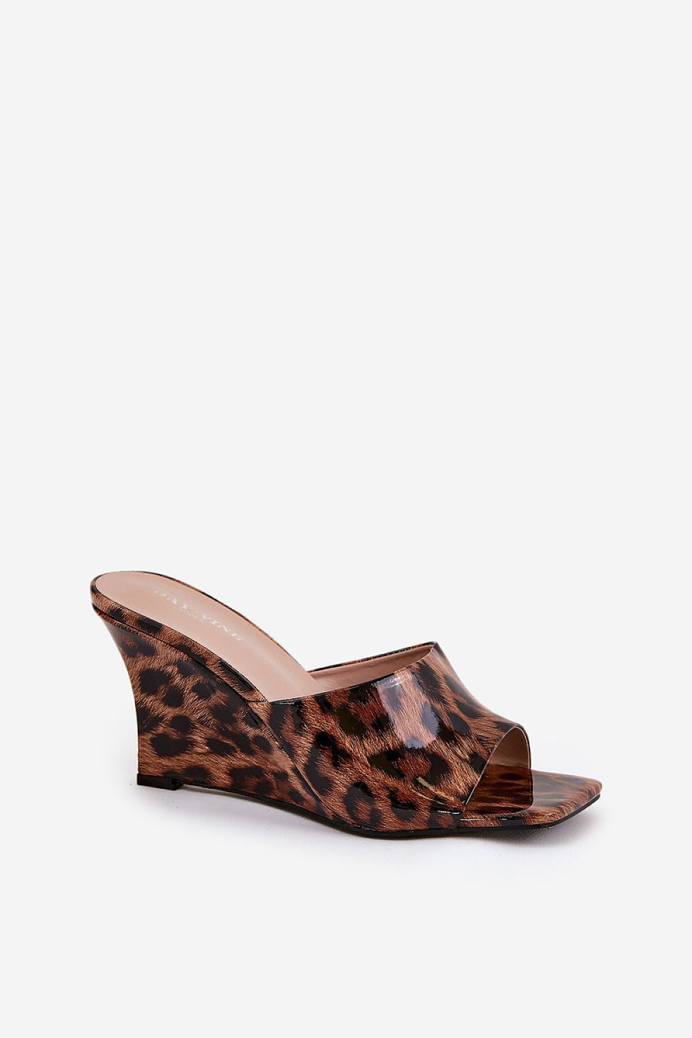 Leopard print slip-on clogs with wedge heel, eco leather upper, and open-toe design, perfect for summer style.