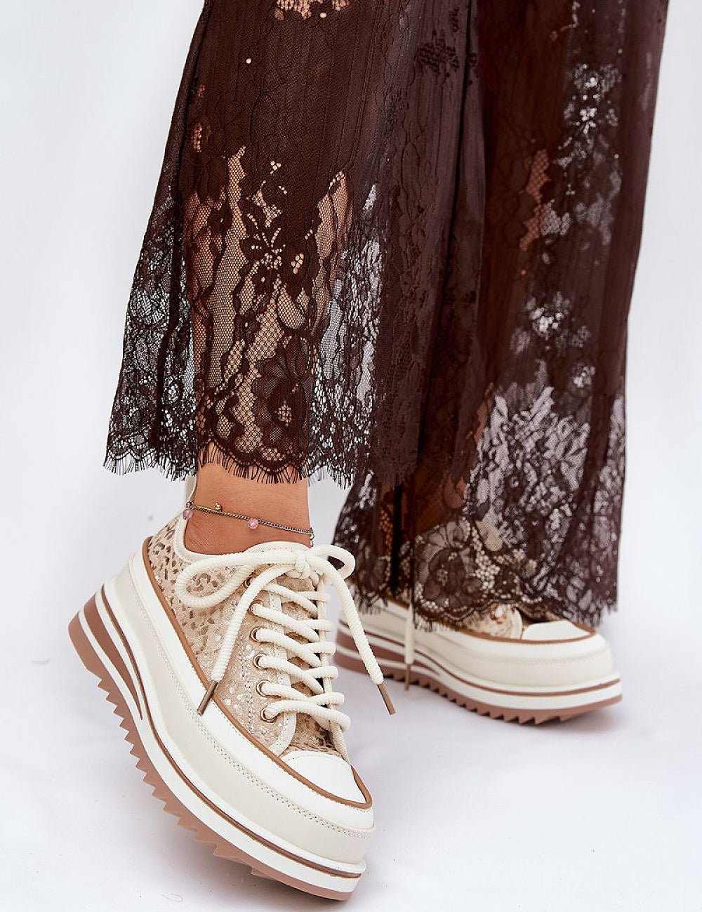 Emlira Thick-Lace Platform Sneakers with a 6.5 cm sole, featuring a textile upper and bold lace design for elevated comfort and style.