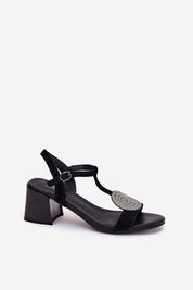 Evelenne leather sandal with sculpted heel, featuring a modern front accent and adjustable ankle strap for elegant, comfortable wear.