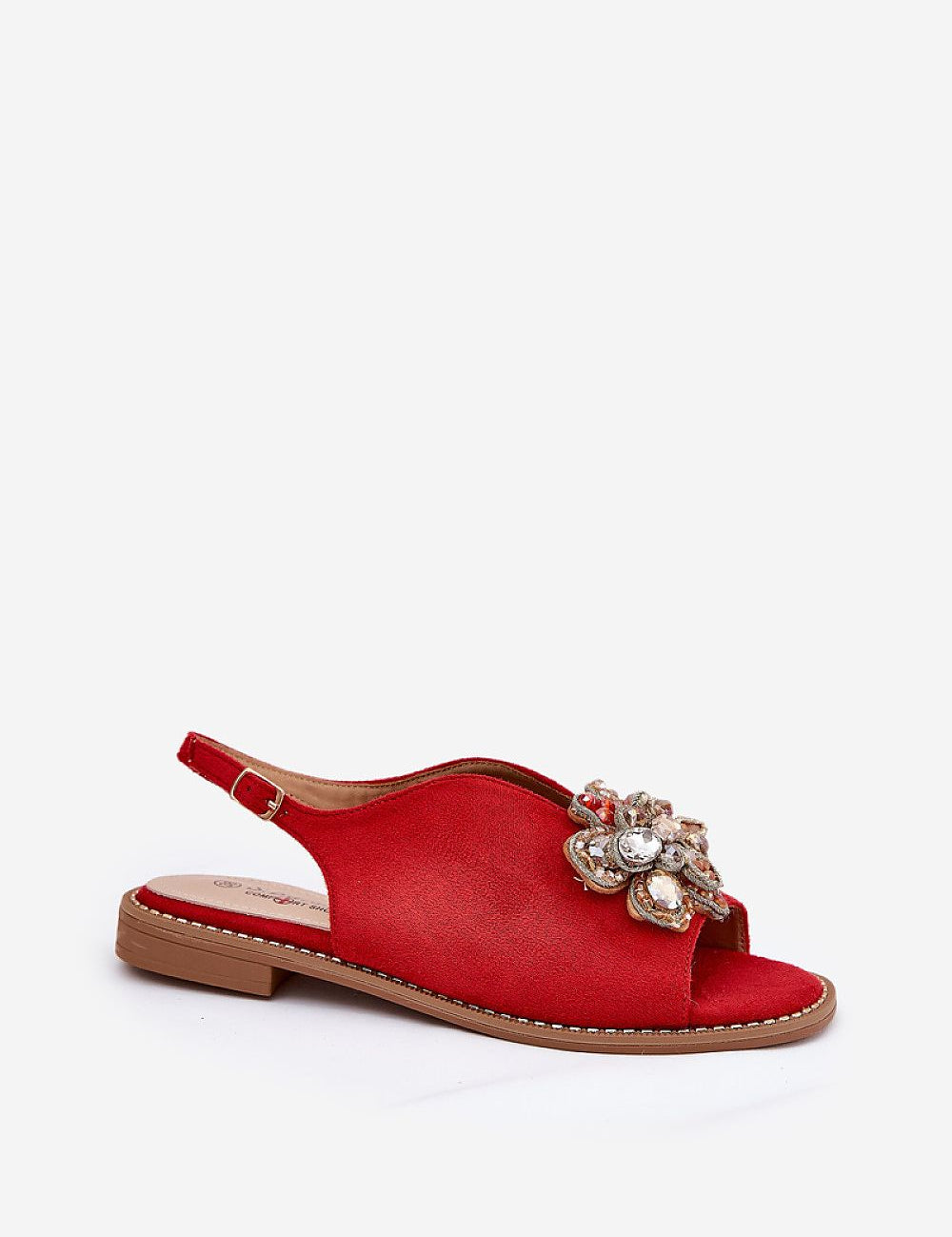 Red Fiorenna flat suede flower sandals with sculpted flower accent and adjustable ankle strap, ideal for everyday wear.