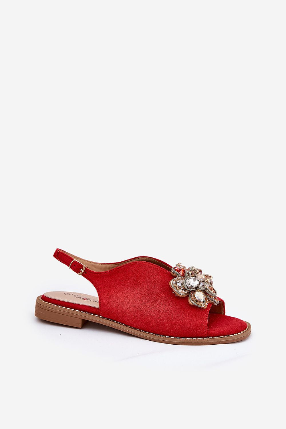 Red Fiorenna flat suede flower sandals with sculpted flower accent and adjustable ankle strap, ideal for everyday wear.
