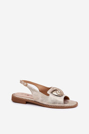 Shiraelle Shimmer Strap Sandals with glossy eco leather and delicate front detail, featuring a flat heel and adjustable ankle strap.