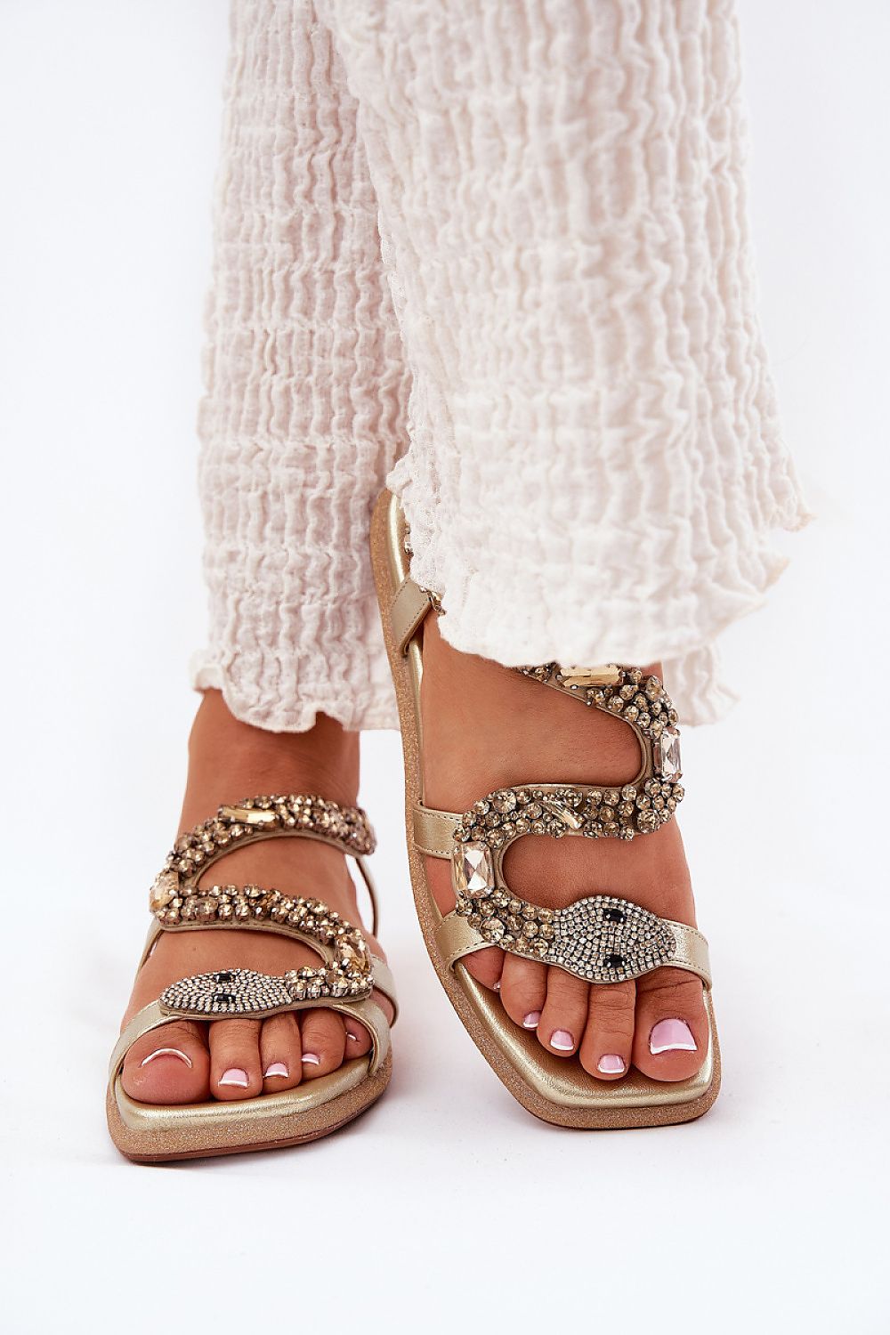 Stylish Nevalia Sandals with Crystal Snake Detail on Eco-Leather, featuring a sequin-trimmed sole for summer elegance.