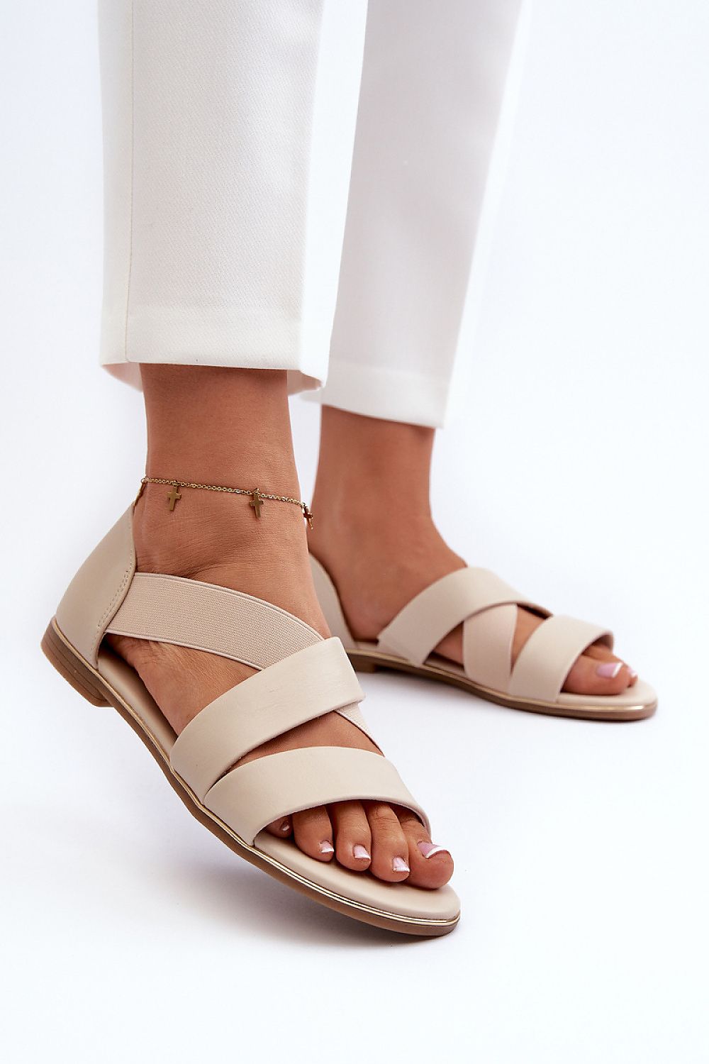 Woman wearing Zirella Elastic Strap Sandals with eco leather, showcasing minimalist design with comfort fit.