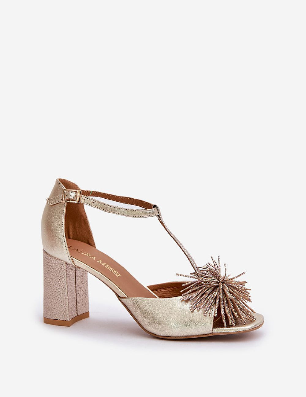 Gold leather column heel sandal with decorative front accent and adjustable strap, perfect for elegant occasions.