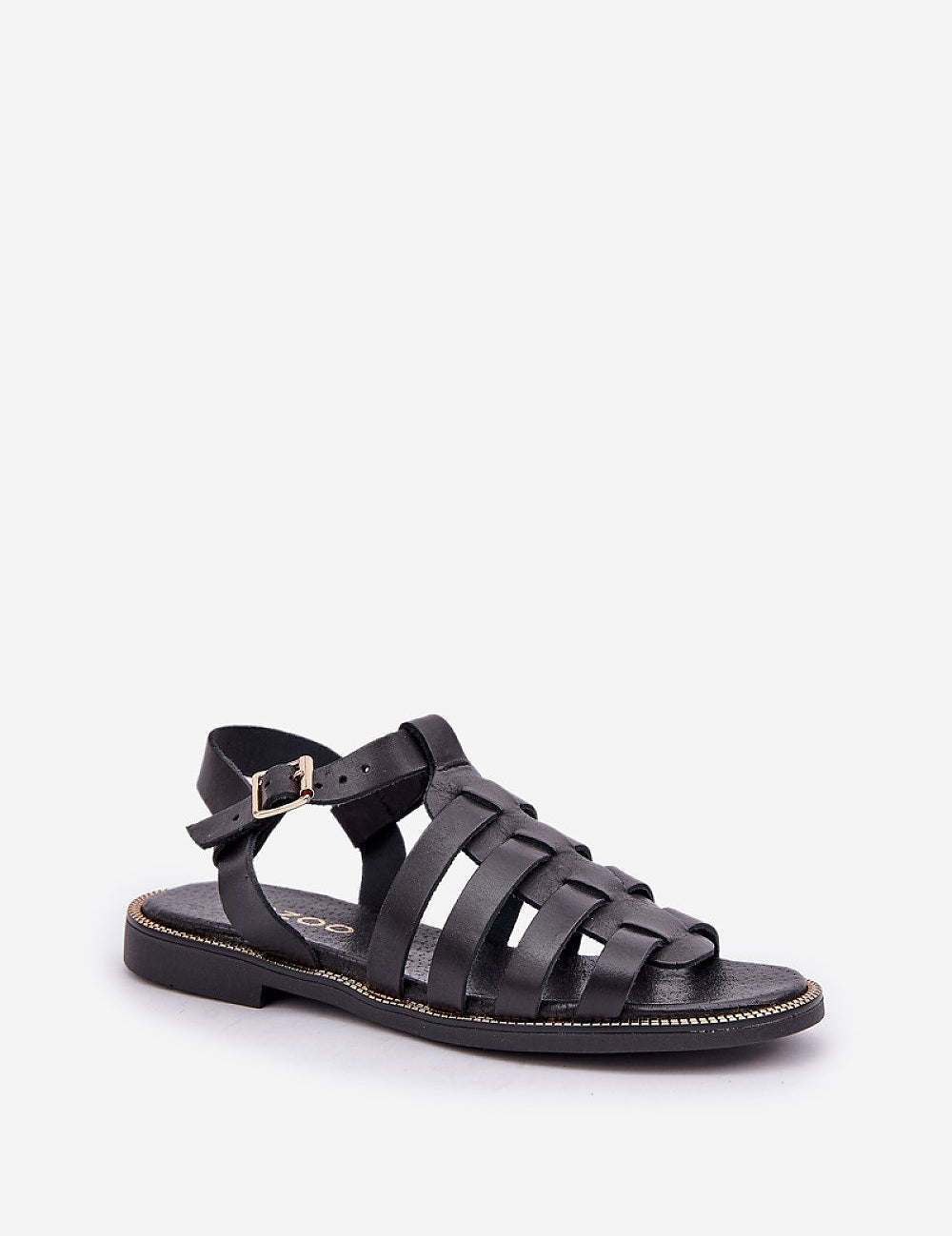 Black flat leather sandals with ankle buckle and woven straps, perfect for casual and elegant wear. Genuine leather; minimal design.