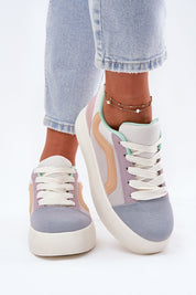 Ravelin Suede Platform Sneakers in pastel colors worn with jeans, featuring eco-suede material and supportive platform sole.